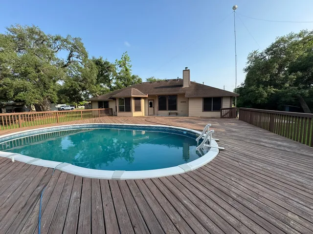 a view of outdoor space with swimming pool