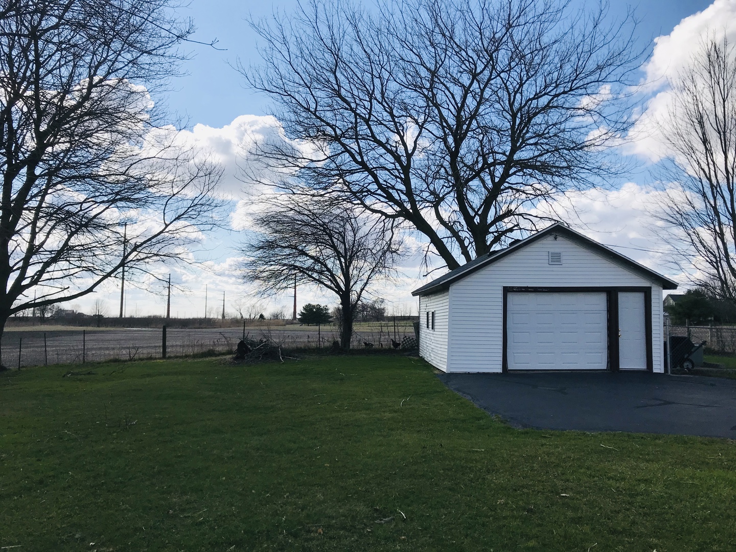 29939 Lukens Road Sycamore, IL 60178 - Photo 2 of 18 a view of a house with a yard