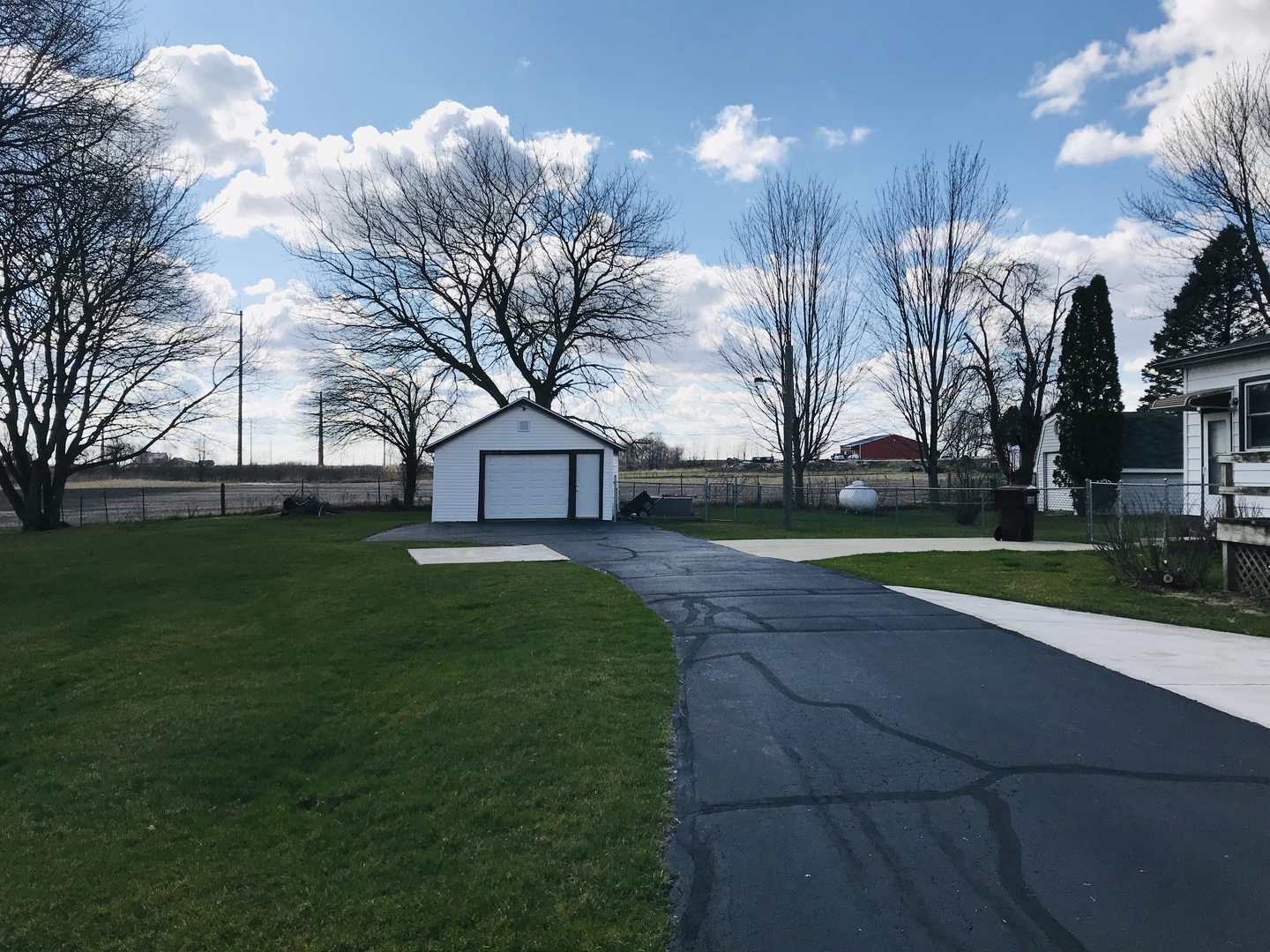 29939 Lukens Road Sycamore, IL 60178 - Photo 16 of 18 a view of a house with a big yard