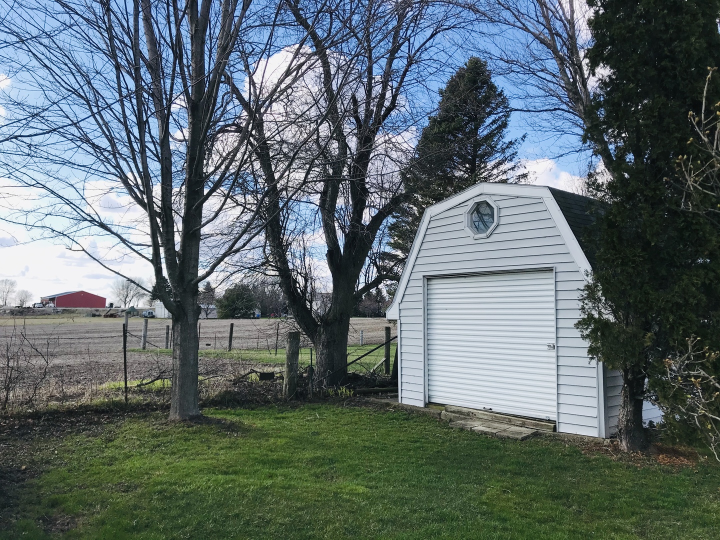 29939 Lukens Road Sycamore, IL 60178 - Photo 3 of 18 a view of a house with a yard