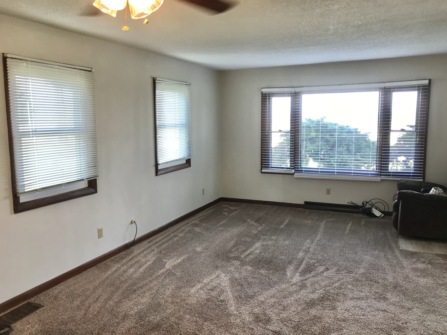 29939 Lukens Road Sycamore, IL 60178 - Photo 5 of 18 a view of an empty room with a window