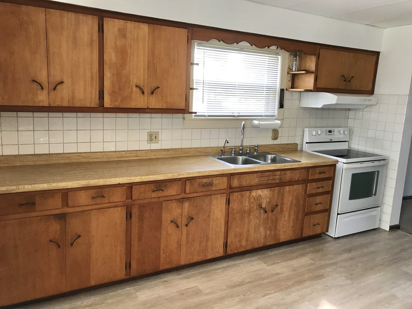 29939 Lukens Road Sycamore, IL 60178 - Photo 6 of 18 a kitchen with stainless steel appliances granite countertop a sink a stove and a microwave