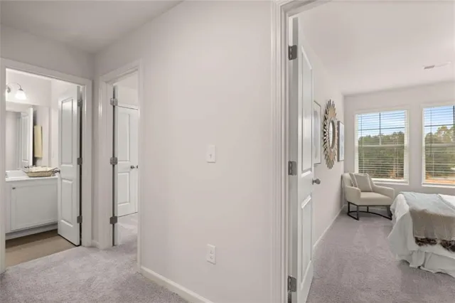 a bedroom with furniture and a chandelier