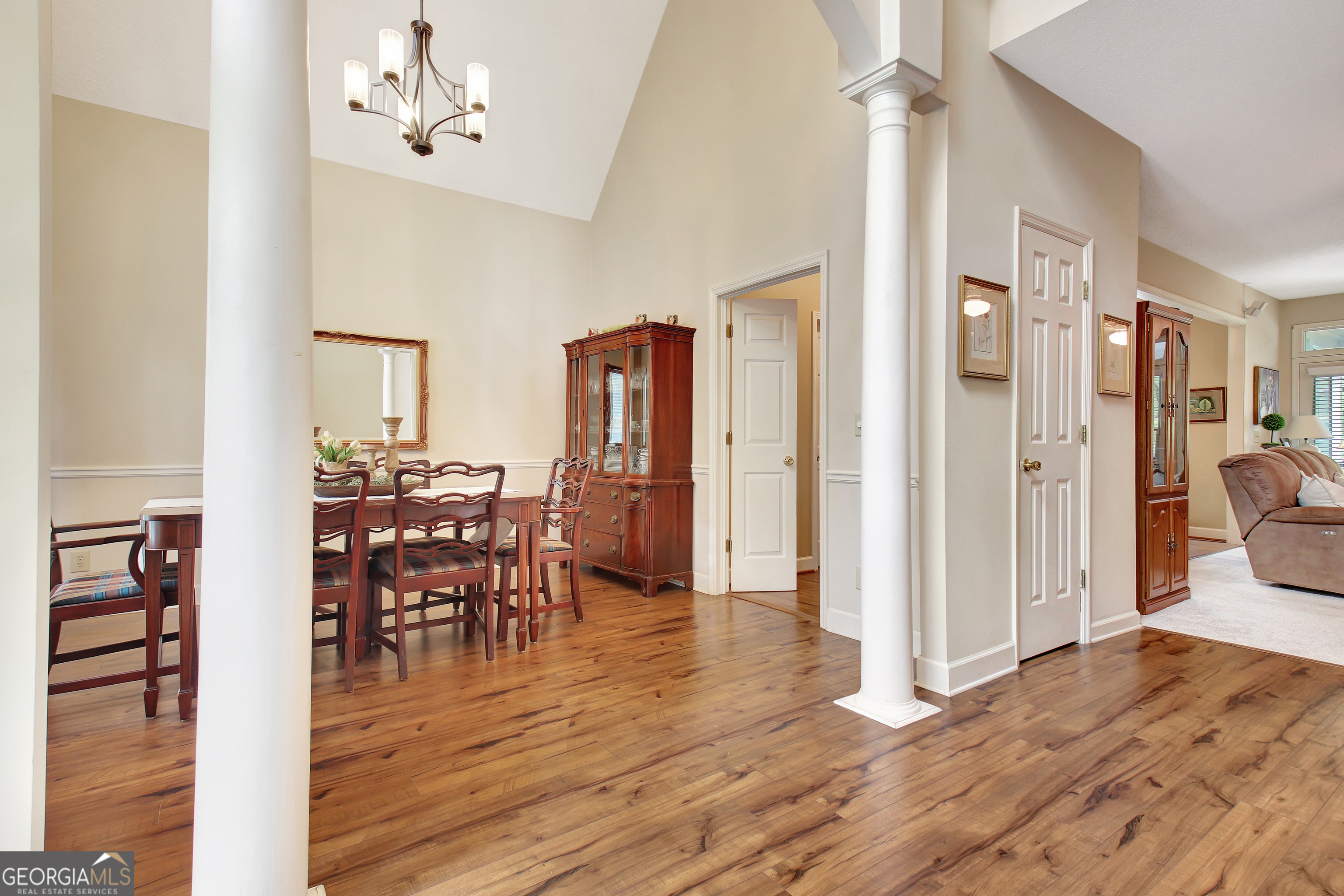 110 Sunset Court Senoia, GA 30276 - Photo 14 of 118 a view of a dining room with furniture and wooden floor