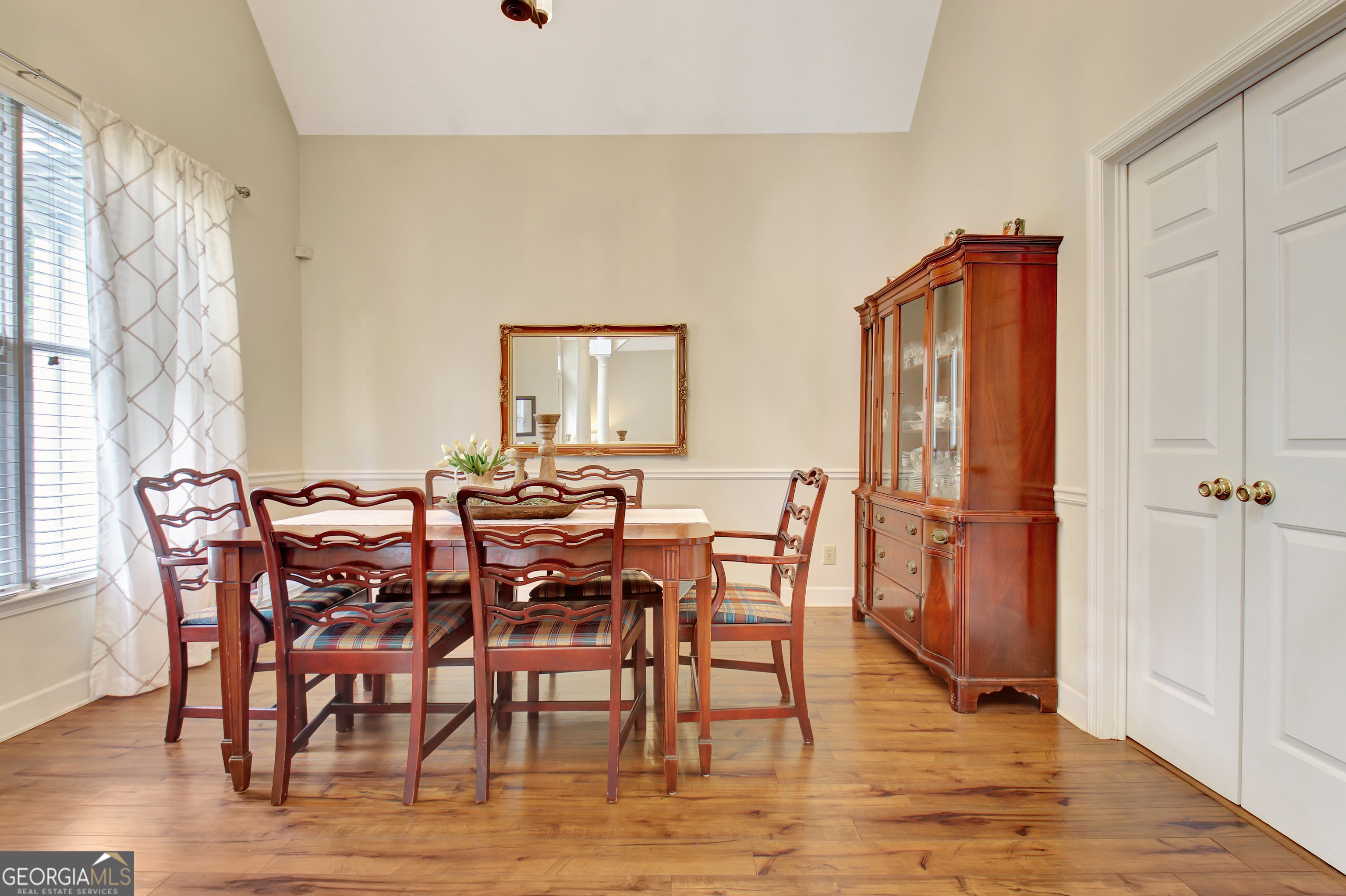 110 Sunset Court Senoia, GA 30276 - Photo 16 of 118 a view of a dining room with furniture and wooden floor