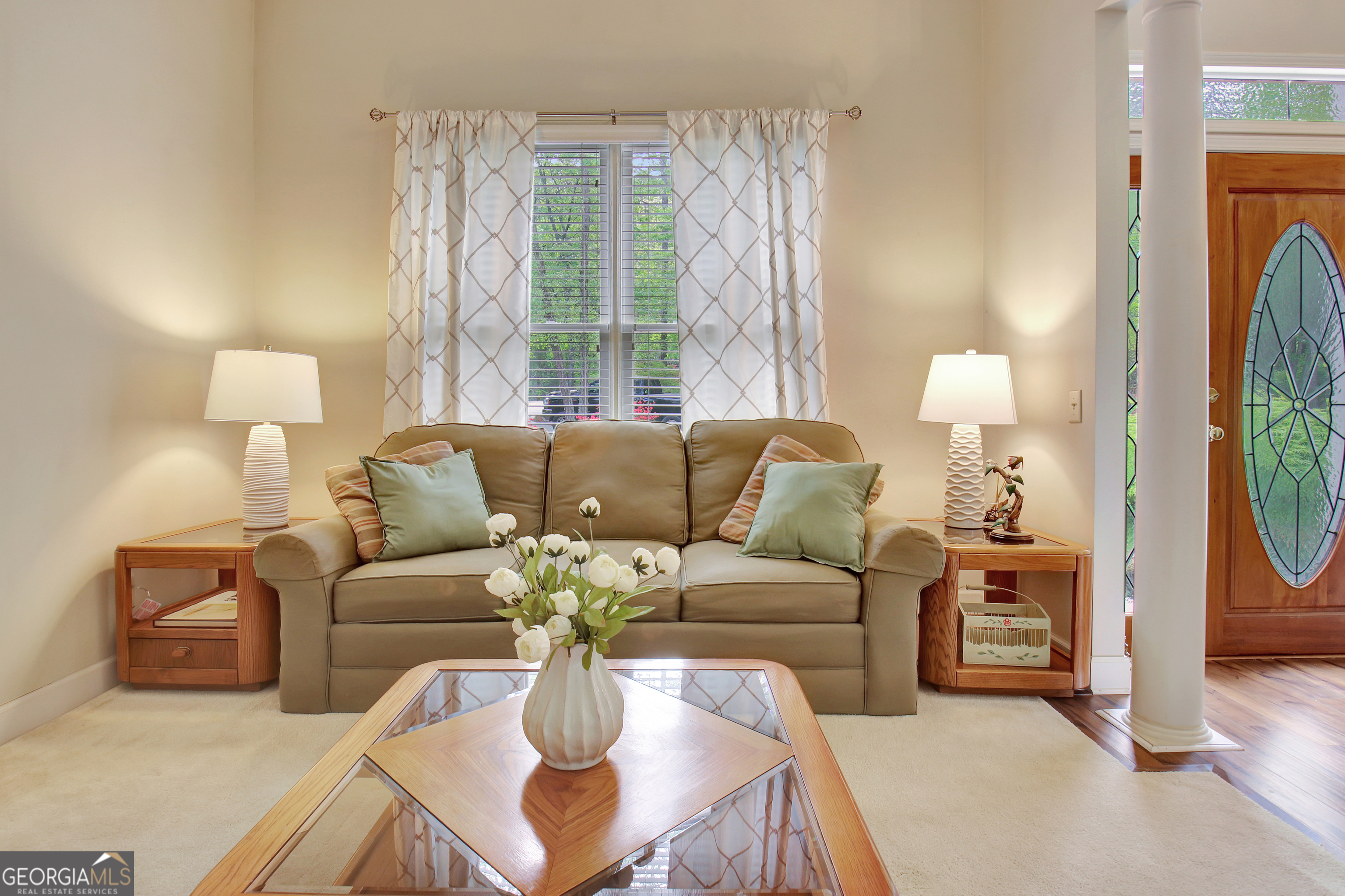110 Sunset Court Senoia, GA 30276 - Photo 24 of 118 a living room with furniture and a large window