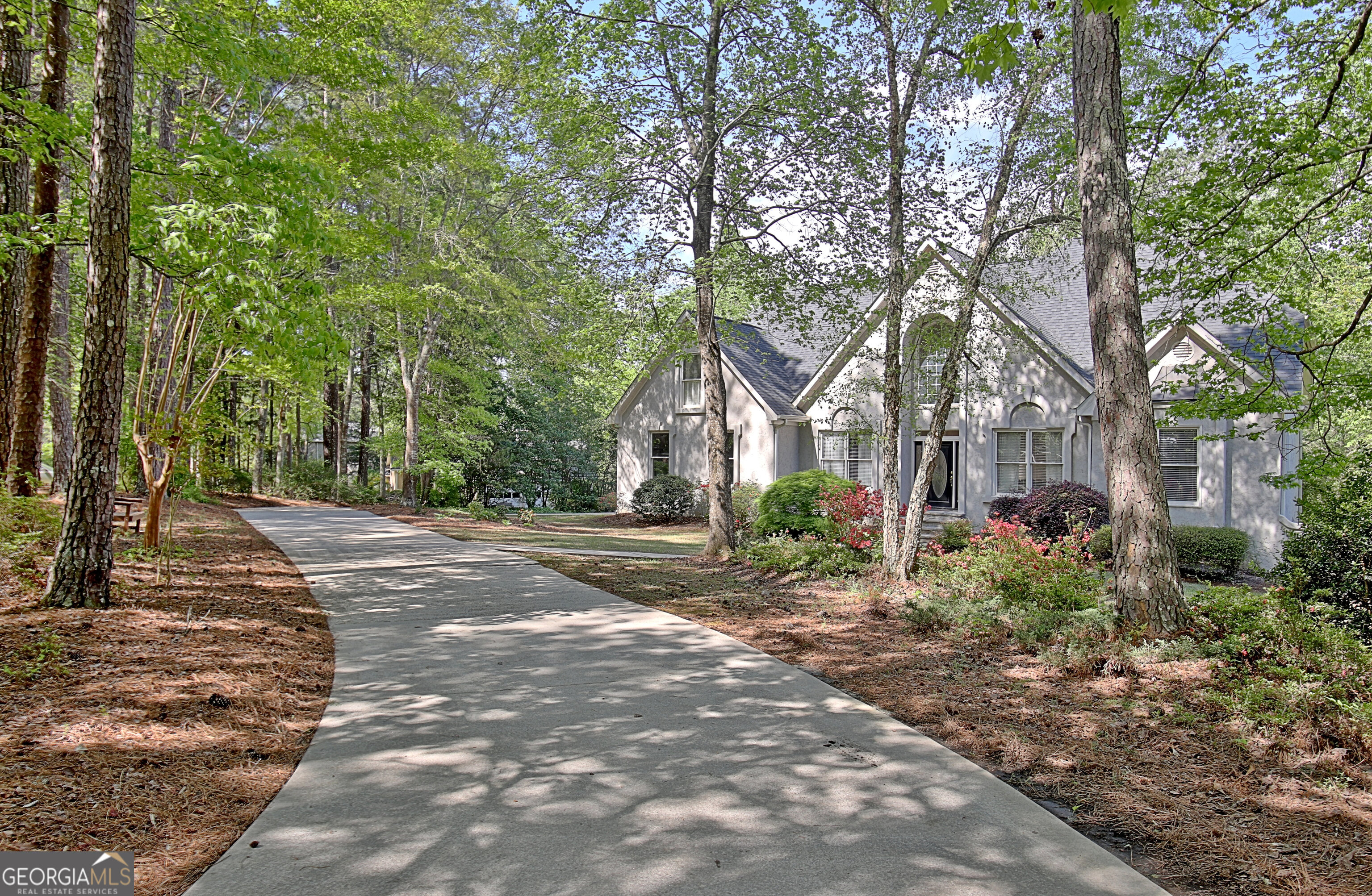 110 Sunset Court Senoia, GA 30276 - Photo 5 of 118 a view of a house with a tree in the background