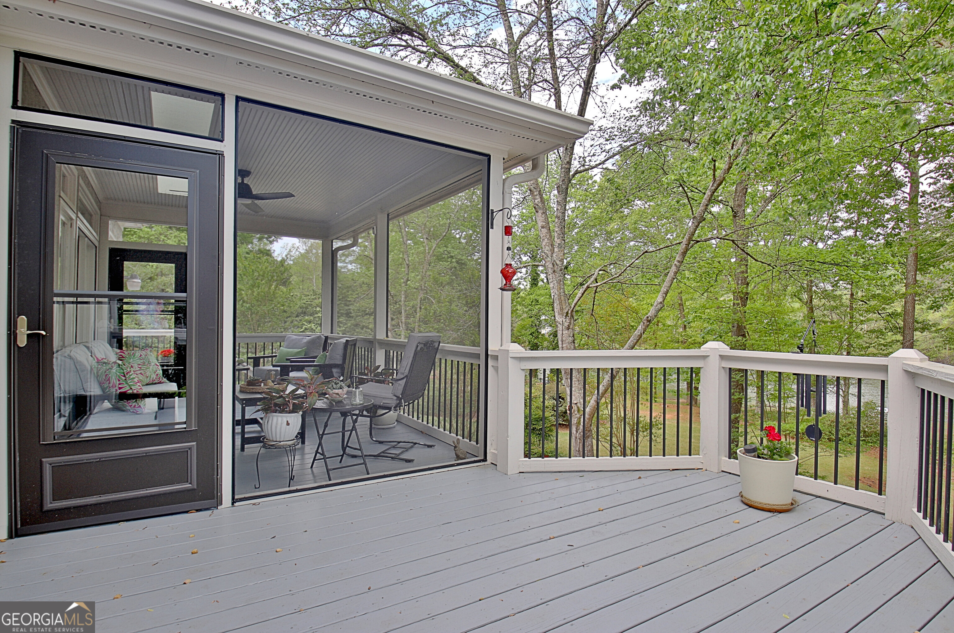 110 Sunset Court Senoia, GA 30276 - Photo 54 of 118 a view of balcony with couch and wooden fence