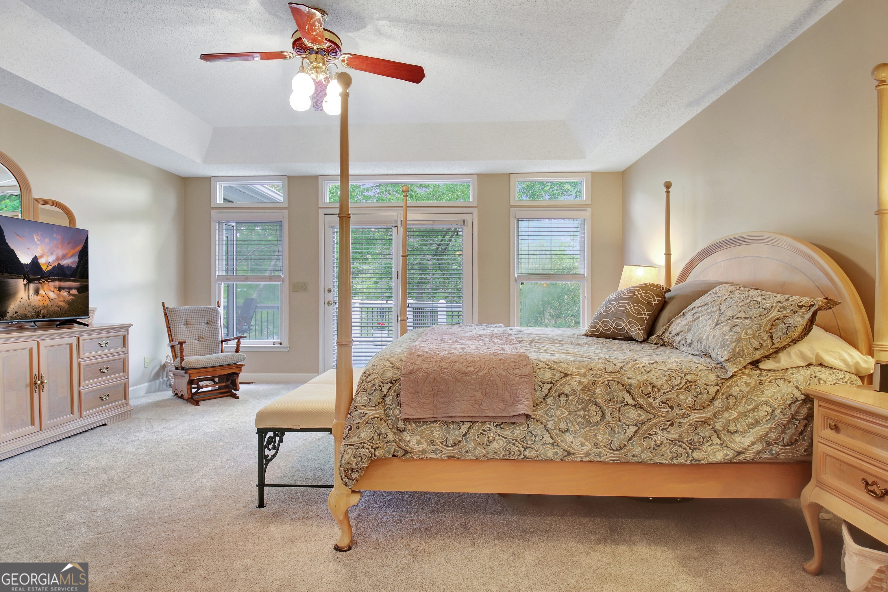 110 Sunset Court Senoia, GA 30276 - Photo 57 of 118 a bed sitting in a bedroom next to a window