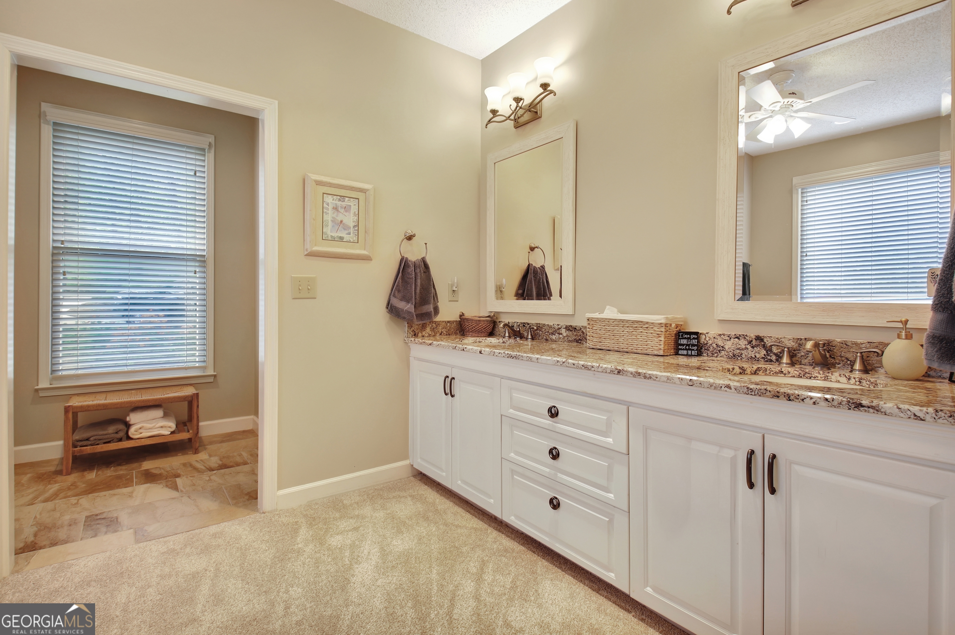 110 Sunset Court Senoia, GA 30276 - Photo 63 of 118 a bathroom with a granite countertop sink mirror and