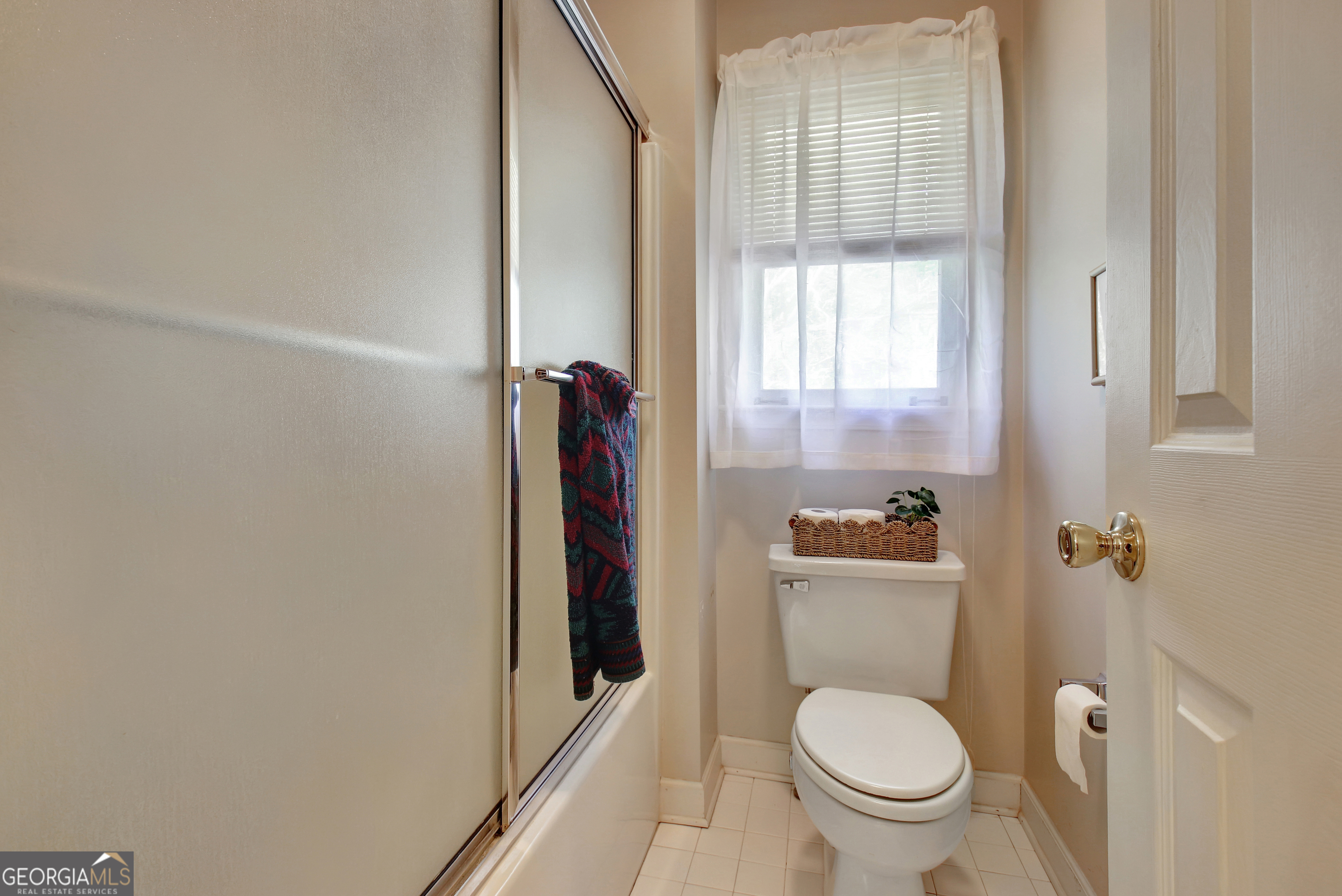 110 Sunset Court Senoia, GA 30276 - Photo 78 of 118 a bathroom with a toilet and a sink