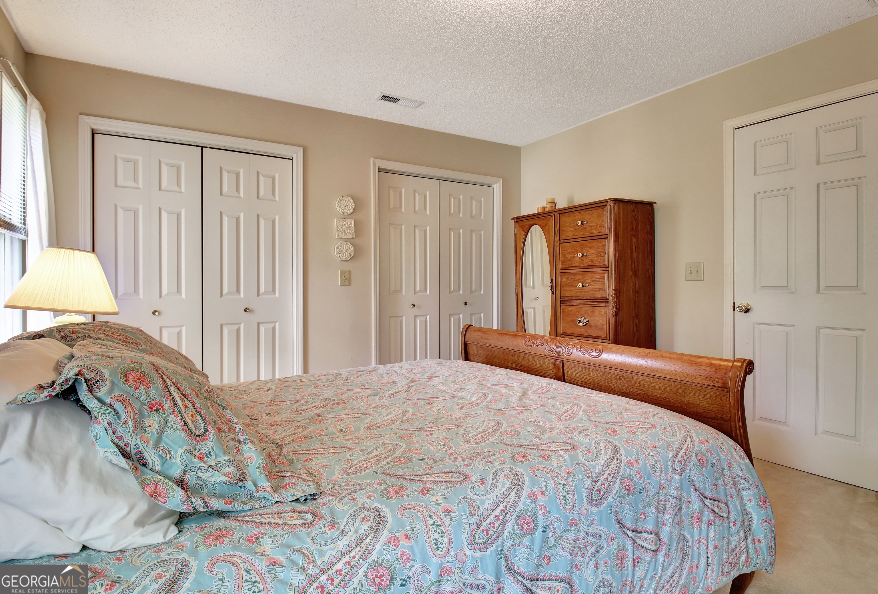 110 Sunset Court Senoia, GA 30276 - Photo 83 of 118 a bedroom with a bed and a closet
