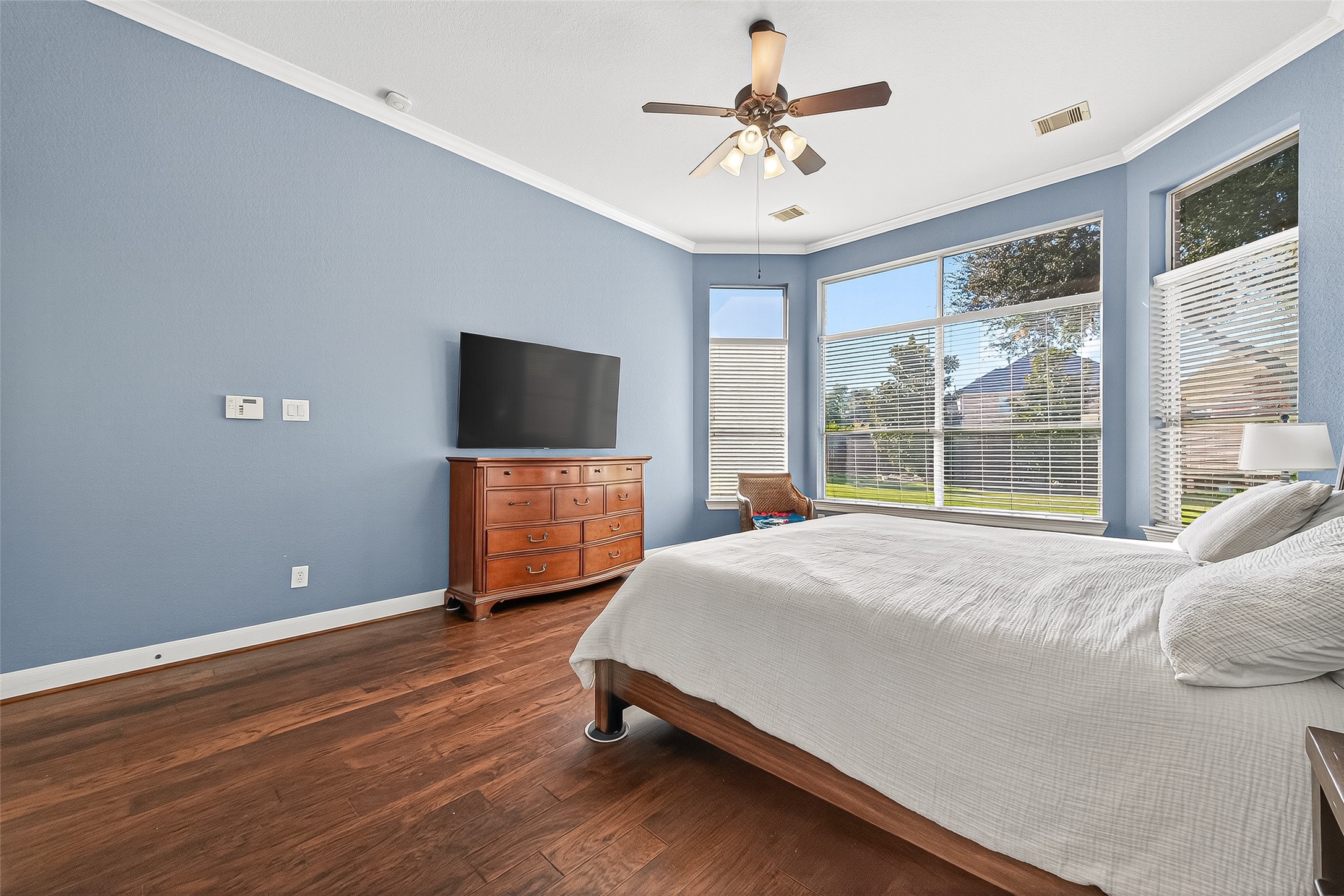 1206 Coleridge Street Sugar Land, TX 77479 - Photo 13 of 46 a bedroom with a bed and a flat screen tv