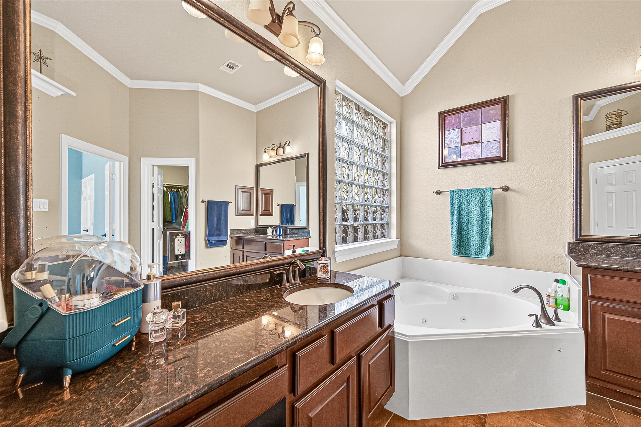 1206 Coleridge Street Sugar Land, TX 77479 - Photo 18 of 46 a spacious bathroom with a tub sink and mirror