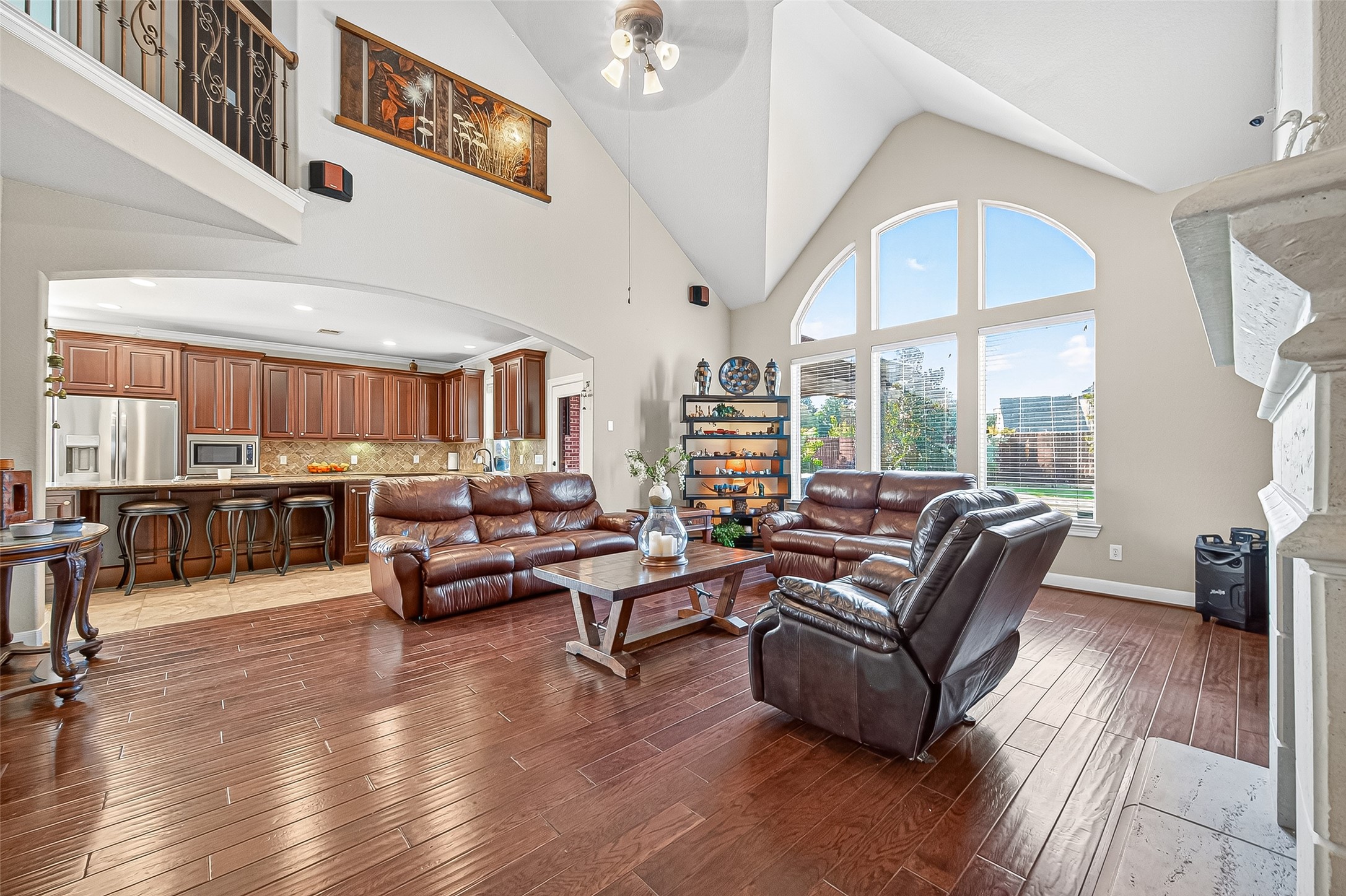1206 Coleridge Street Sugar Land, TX 77479 - Photo 32 of 46 a living room with lots of furniture and wooden floor