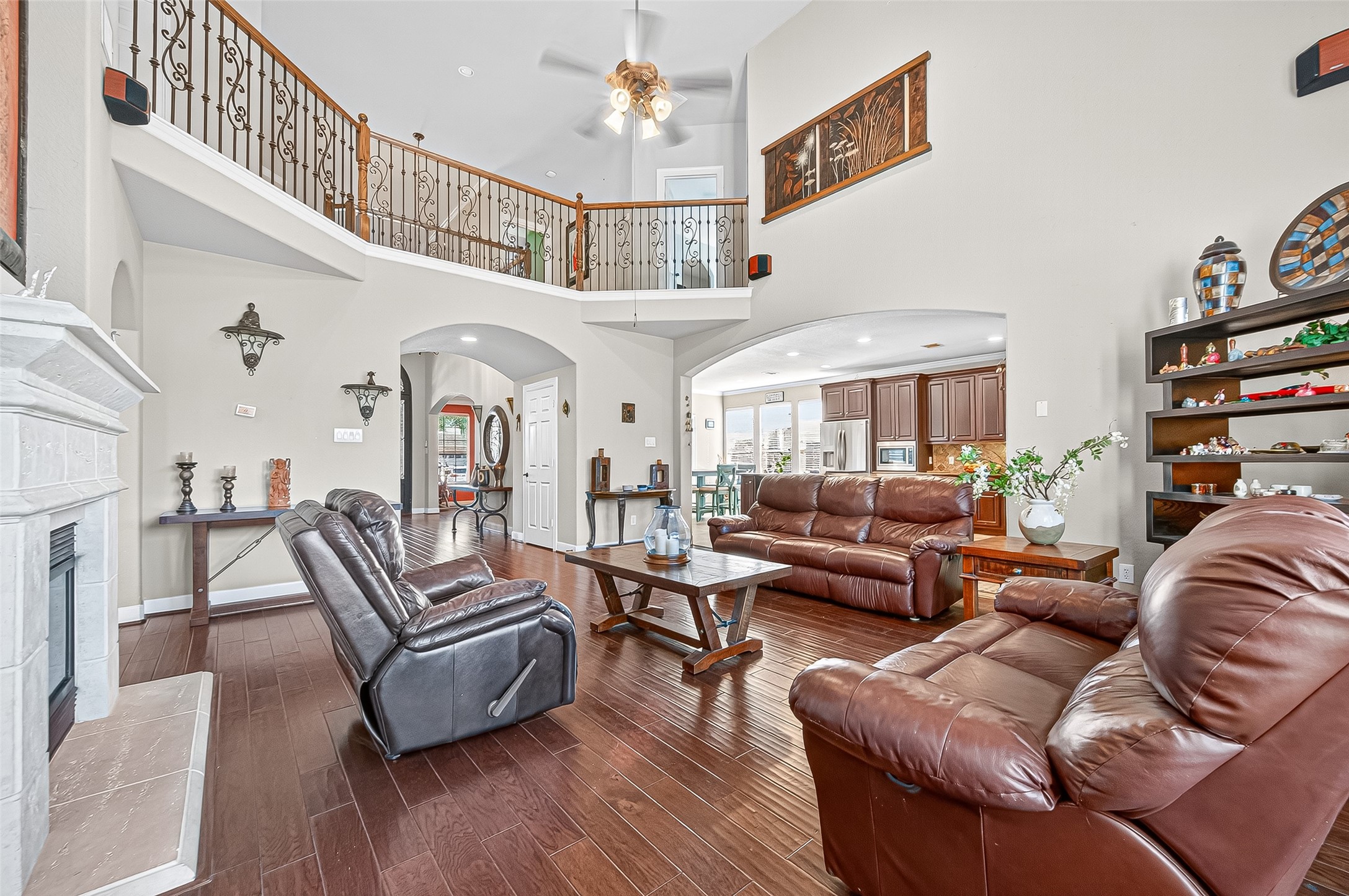 1206 Coleridge Street Sugar Land, TX 77479 - Photo 33 of 46 a living room with furniture and a chandelier