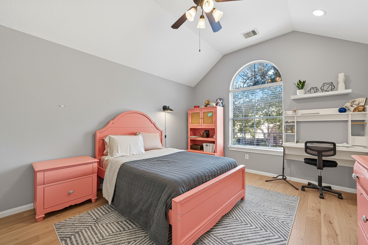 1206 Coleridge Street Sugar Land, TX 77479 - Photo 42 of 46 a bedroom with a bed and a window