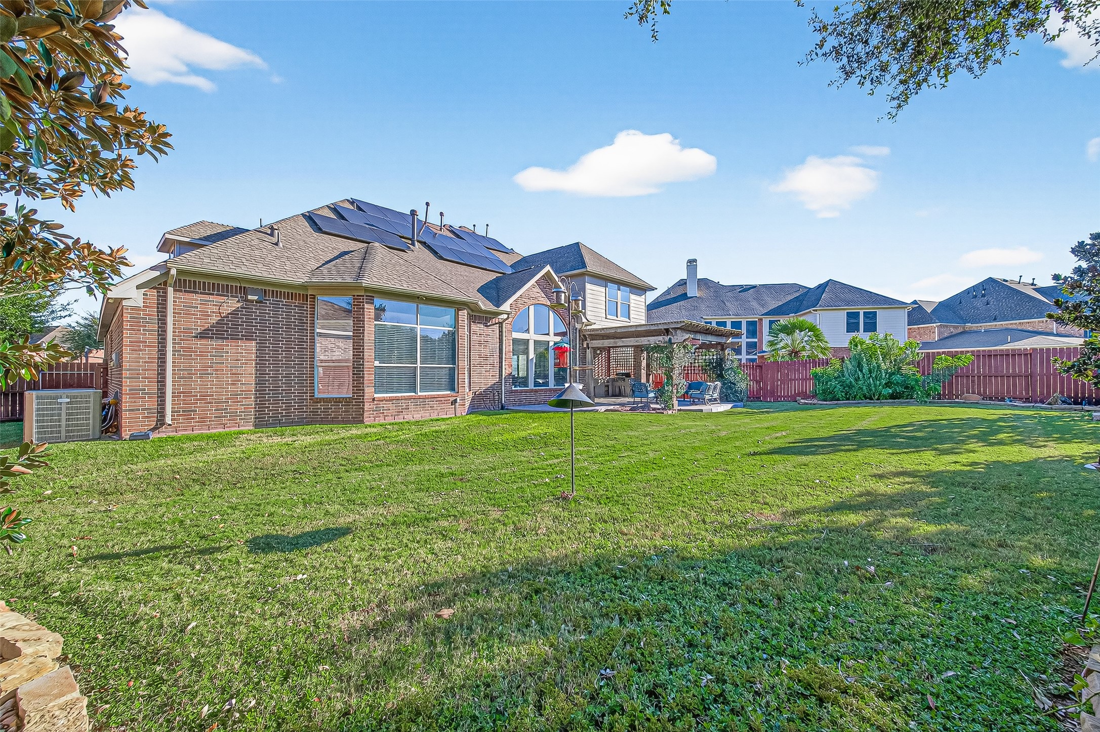1206 Coleridge Street Sugar Land, TX 77479 - Photo 45 of 46 a front view of house with yard and green space