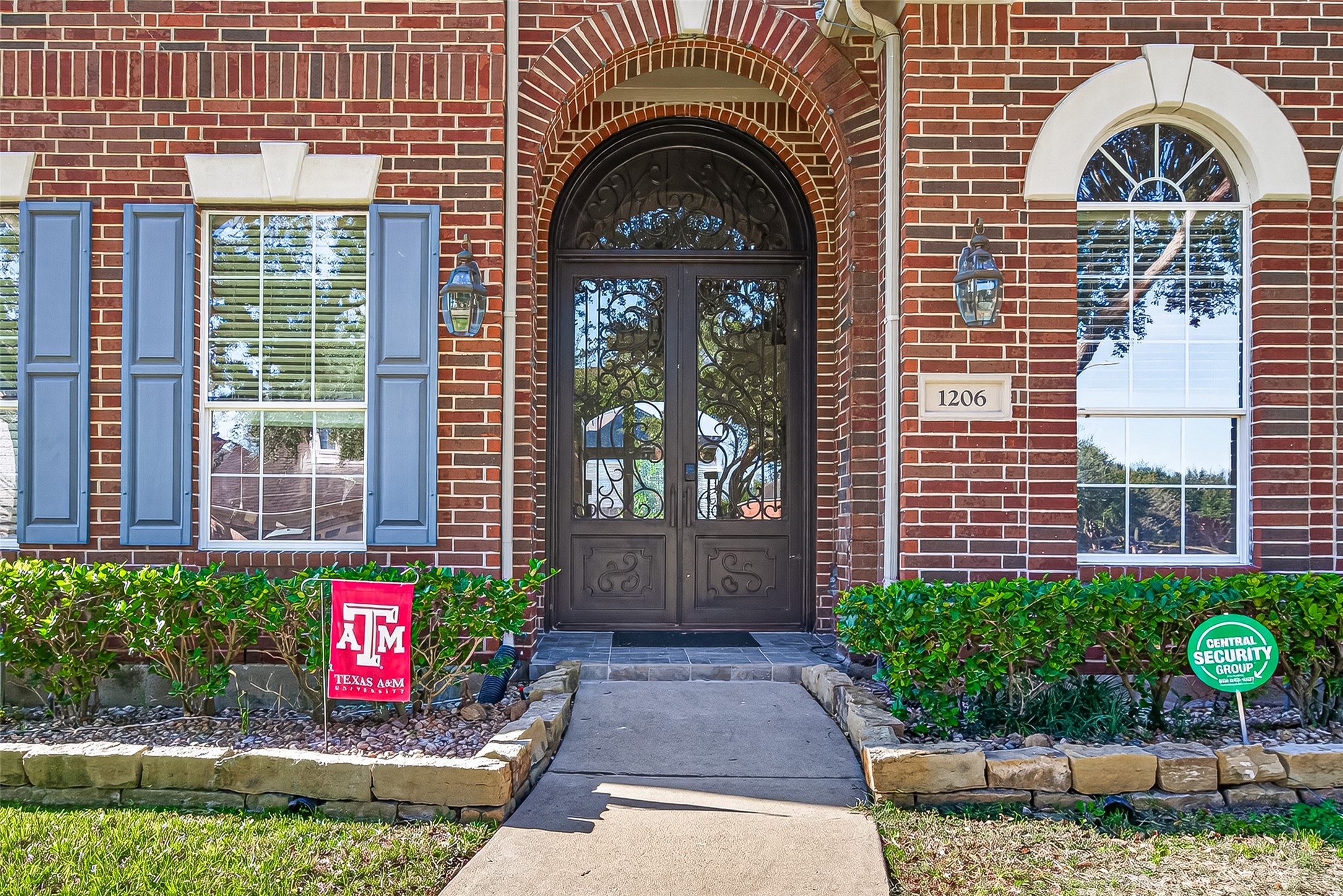 1206 Coleridge Street Sugar Land, TX 77479 - Photo 6 of 46 a front view of a house with plants