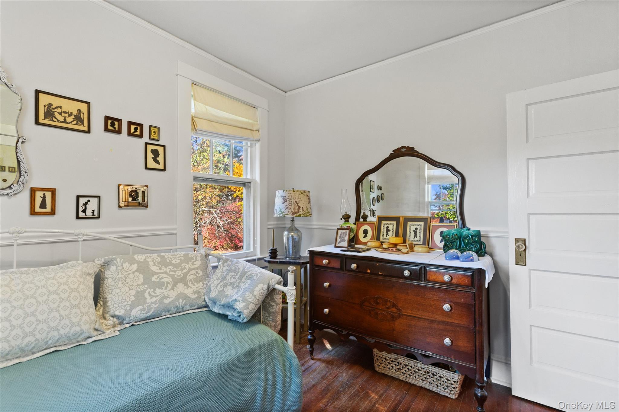 1753 Lawrence Road Mohegan Lake, NY 10547 - Photo 19 of 33 a bedroom with a bed and a dresser
