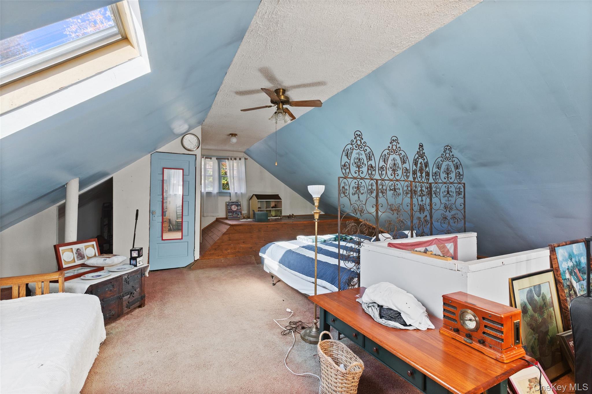 1753 Lawrence Road Mohegan Lake, NY 10547 - Photo 24 of 33 a living room with furniture and a chandelier
