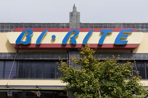 a view of a building with a glass door