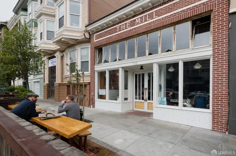 a view of street with shops