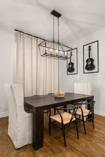 a kitchen with a refrigerator sink and stove