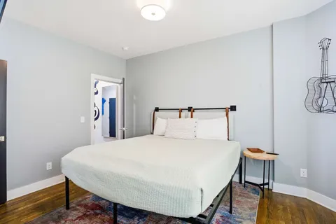 a view of a hallway with washer and dryer