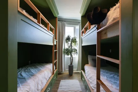 a bathroom with a sink a mirror and shower