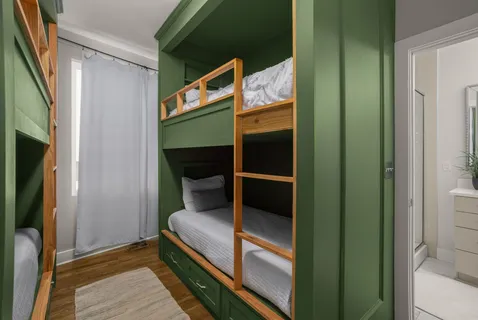 a view of a hall with white walls