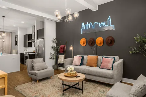 a view of a dining room with furniture and window