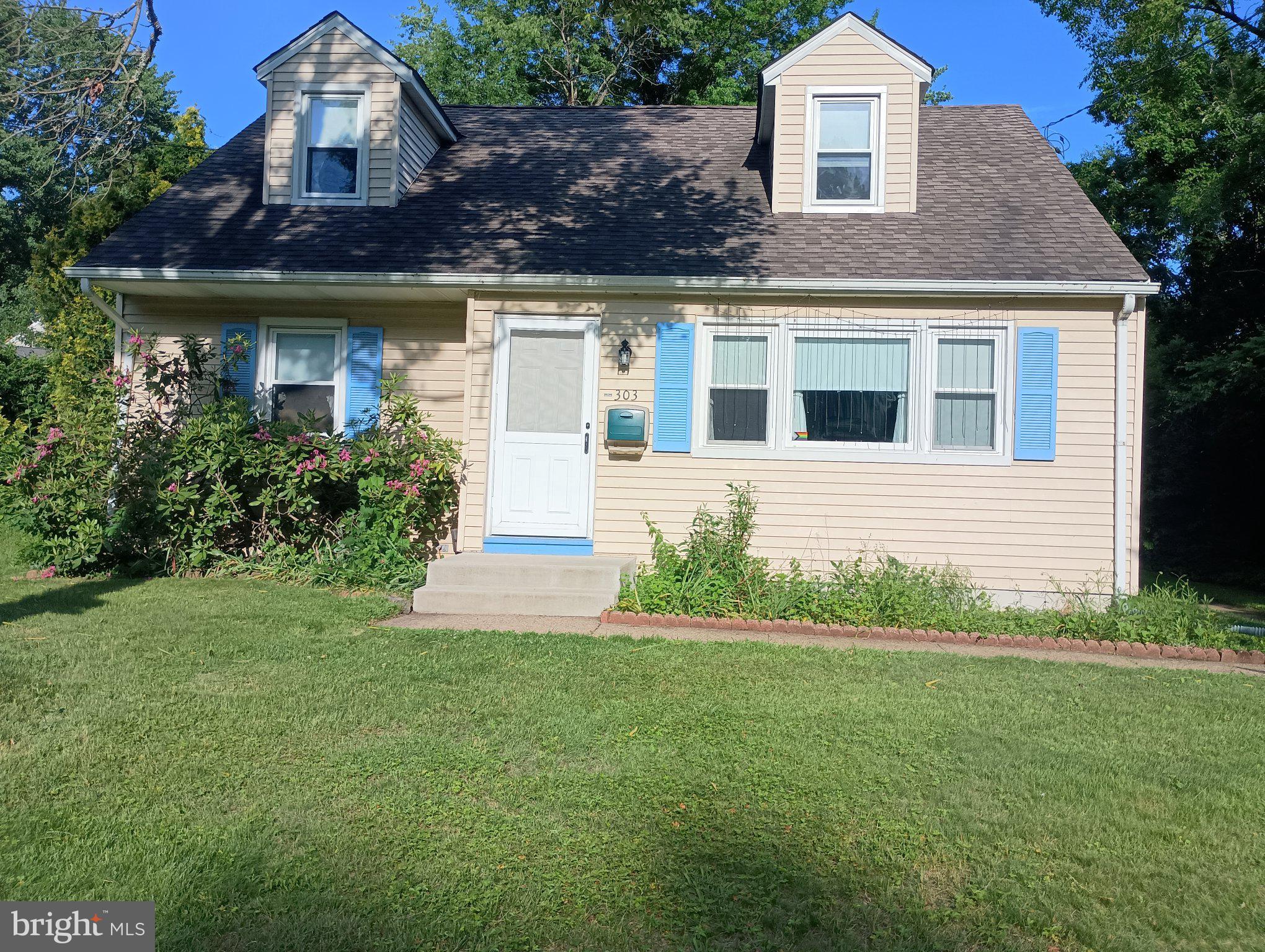 303 Wynnewood Road Ewing, NJ 08628 - Photo 2 of 28 Charming cottage with lush greenery.