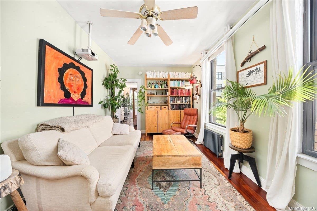 151 Eagle Street, Unit 3 Brooklyn, NY 11222 - Photo 6 of 11 a living room with furniture and a rug