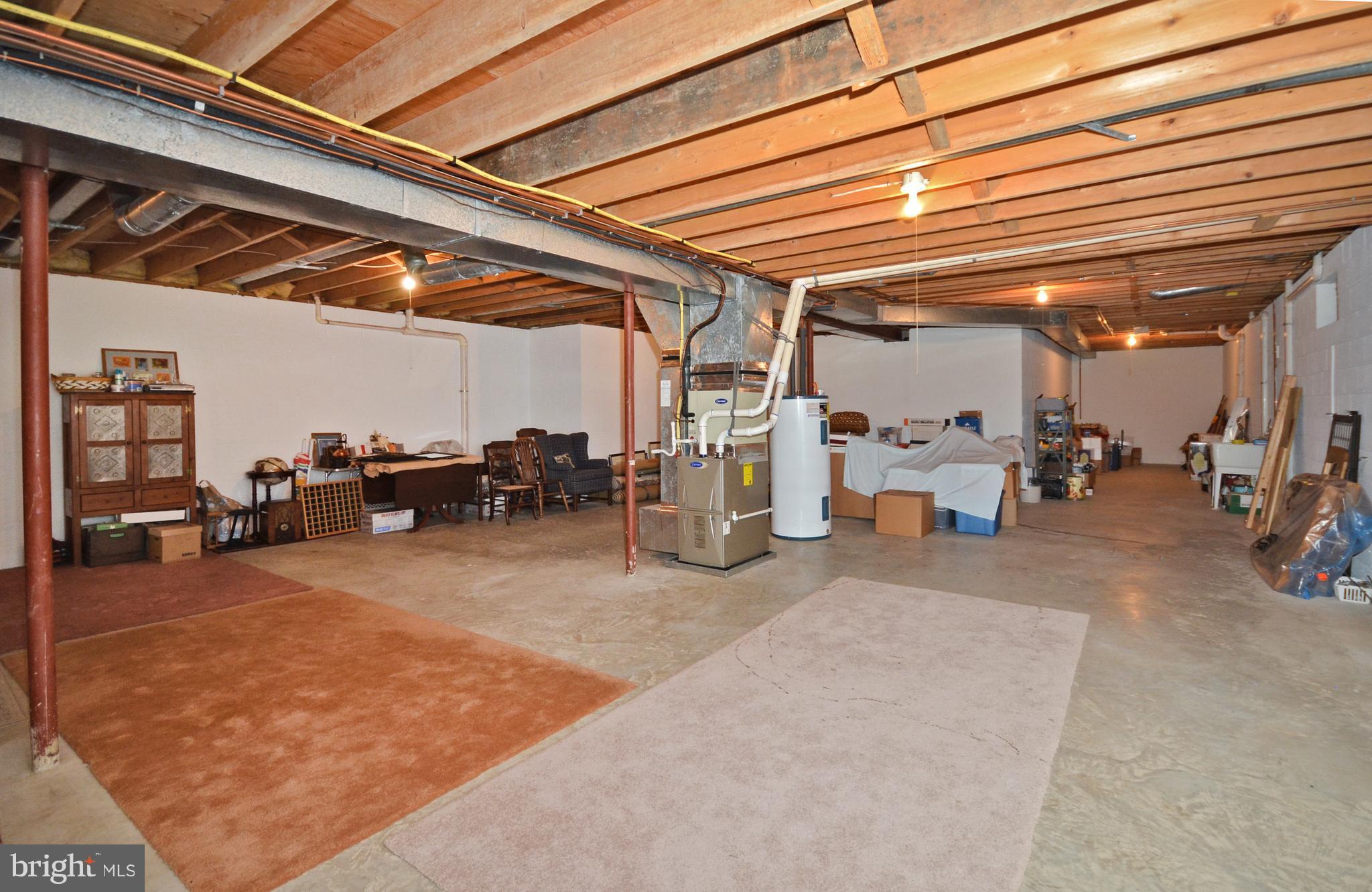 12612 Timber Grove Road Reisterstown, MD 21136 - Photo 25 of 28 lower level with 9' ceiling, sliders, bath rough i