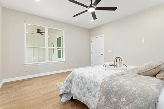 a bathroom with a sink tub and shower