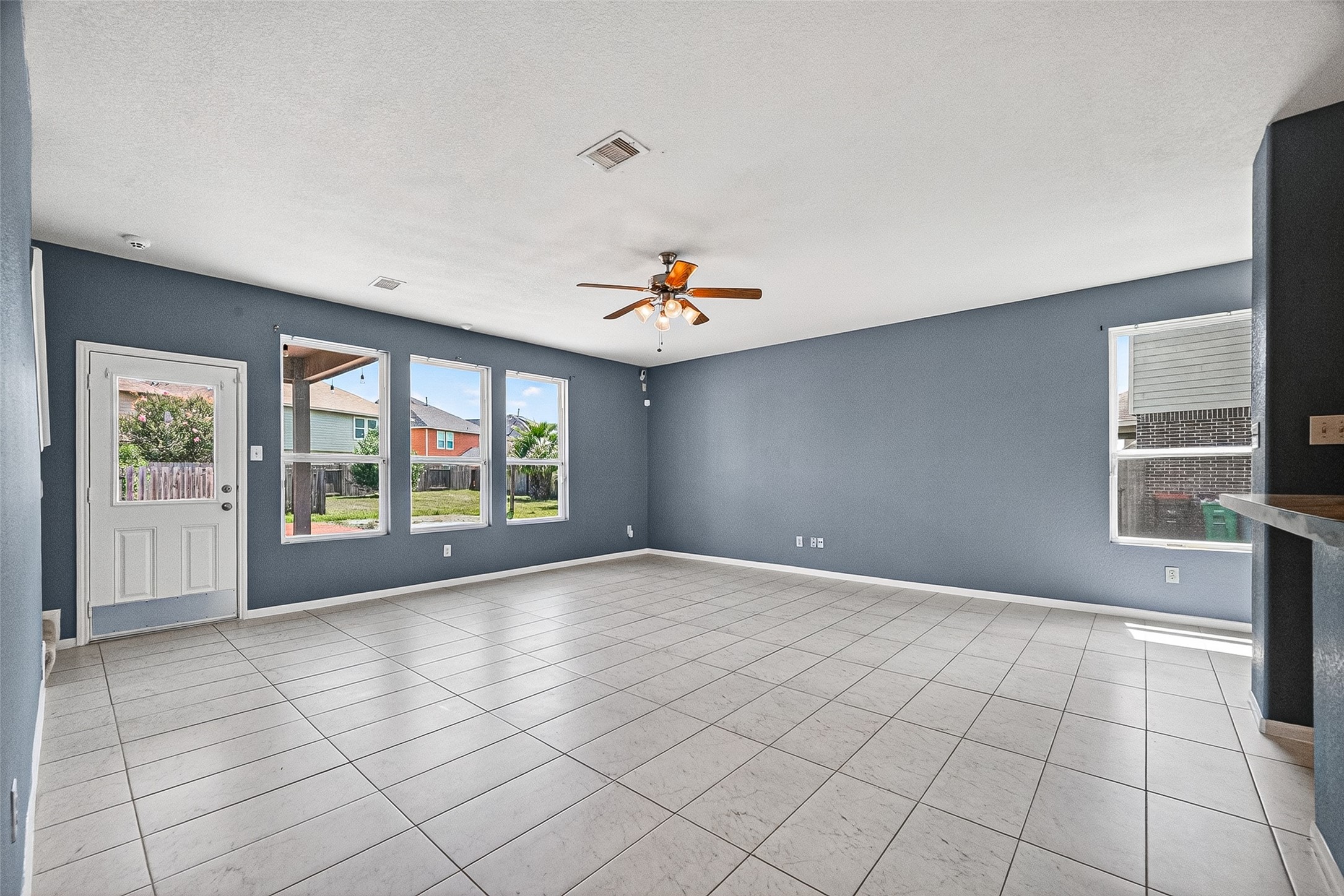 2702 Modano Court Fresno, TX 77545 - Photo 7 of 46 a view of an empty room with a window