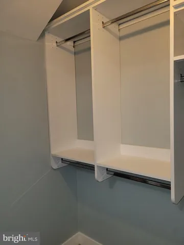 a bathroom with a bathtub and toilet