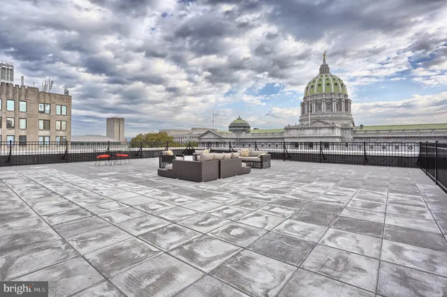 a view of a living room with a large window