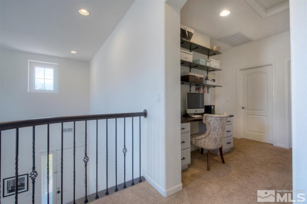 431 Shire Court Reno, NV 89521 - Photo 12 of 40 a view of a hallway with chairs