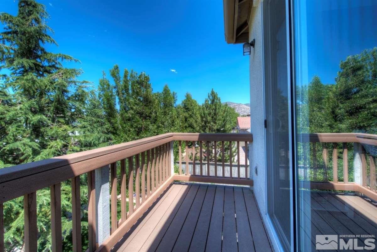 431 Shire Court Reno, NV 89521 - Photo 15 of 40 a view of balcony with wooden floor and fence