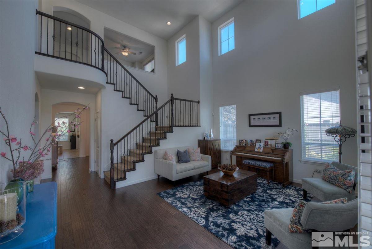 431 Shire Court Reno, NV 89521 - Photo 2 of 40 a living room with furniture chess board and a couch