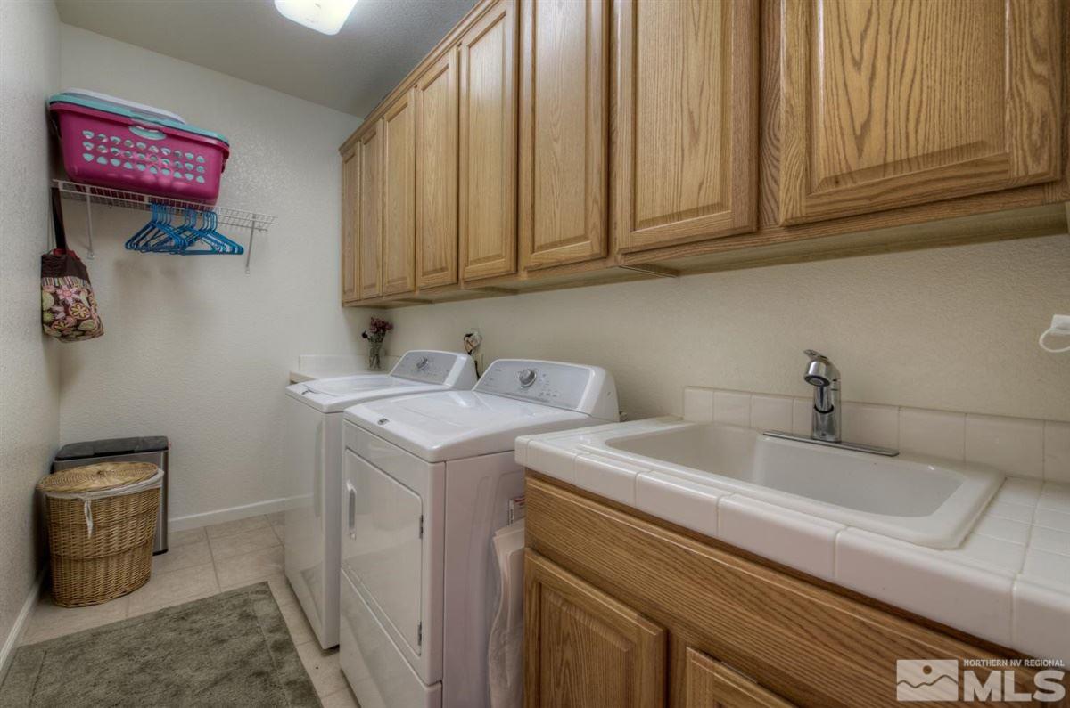 431 Shire Court Reno, NV 89521 - Photo 26 of 40 a utility room with dryer and washer