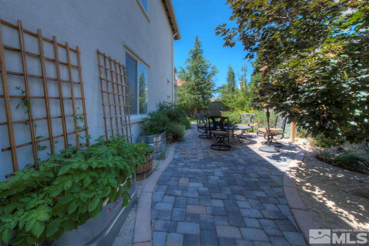 431 Shire Court Reno, NV 89521 - Photo 32 of 40 a view of a patio with plants and bench