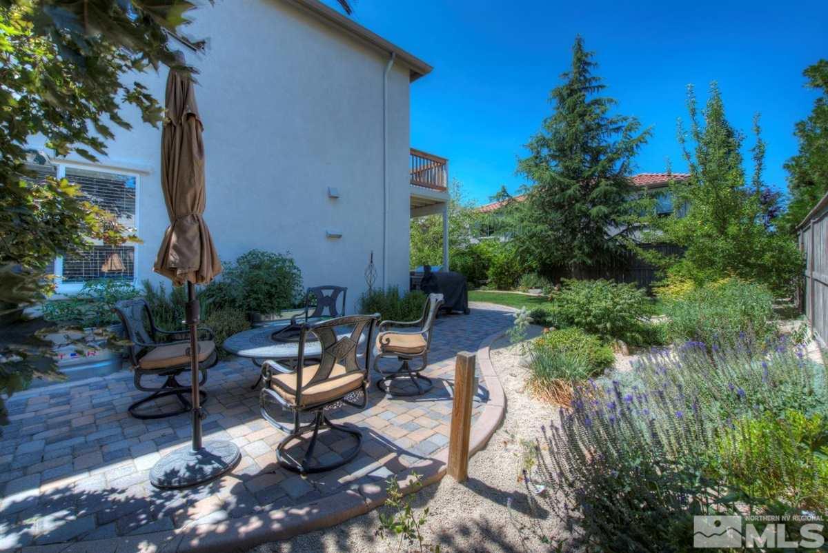 431 Shire Court Reno, NV 89521 - Photo 33 of 40 a view of a backyard with sitting area