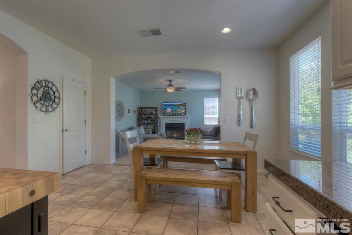 431 Shire Court Reno, NV 89521 - Photo 6 of 40 a room with a table and chairs