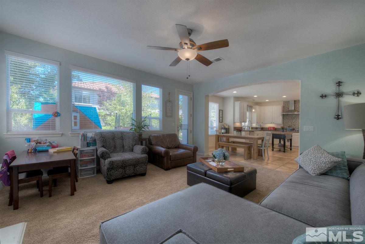 431 Shire Court Reno, NV 89521 - Photo 9 of 40 a living room with furniture and a large window