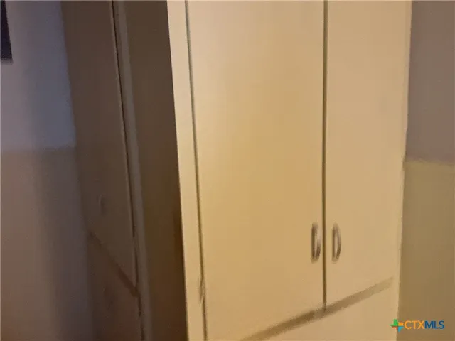 a room with furniture and a window