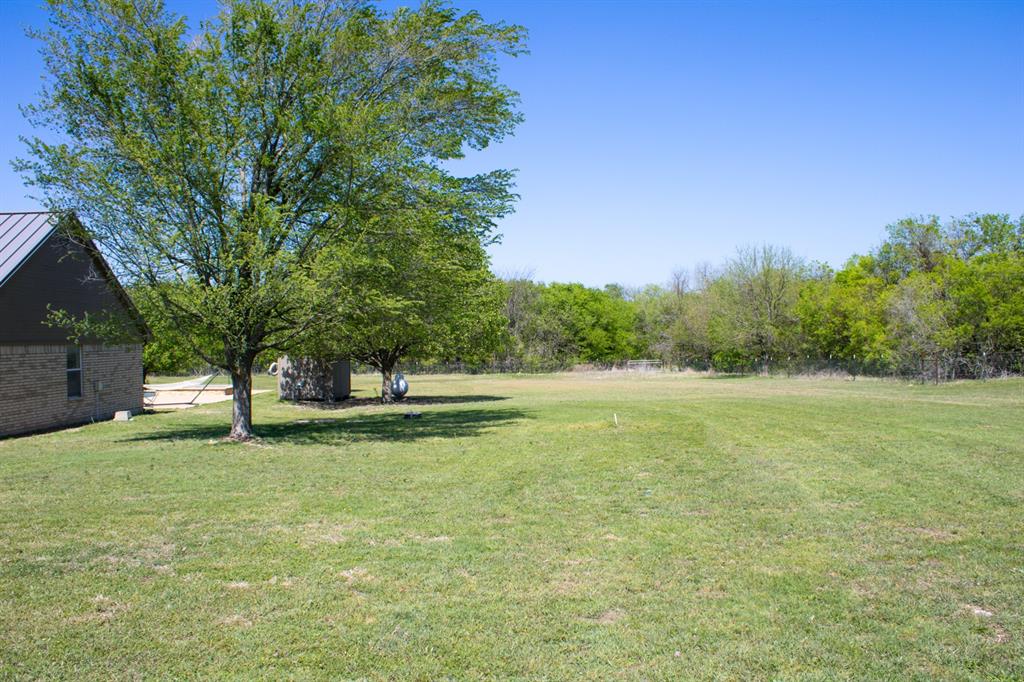 611 Gladness, Unit A Rhome, TX 76078 - Photo 3 of 40