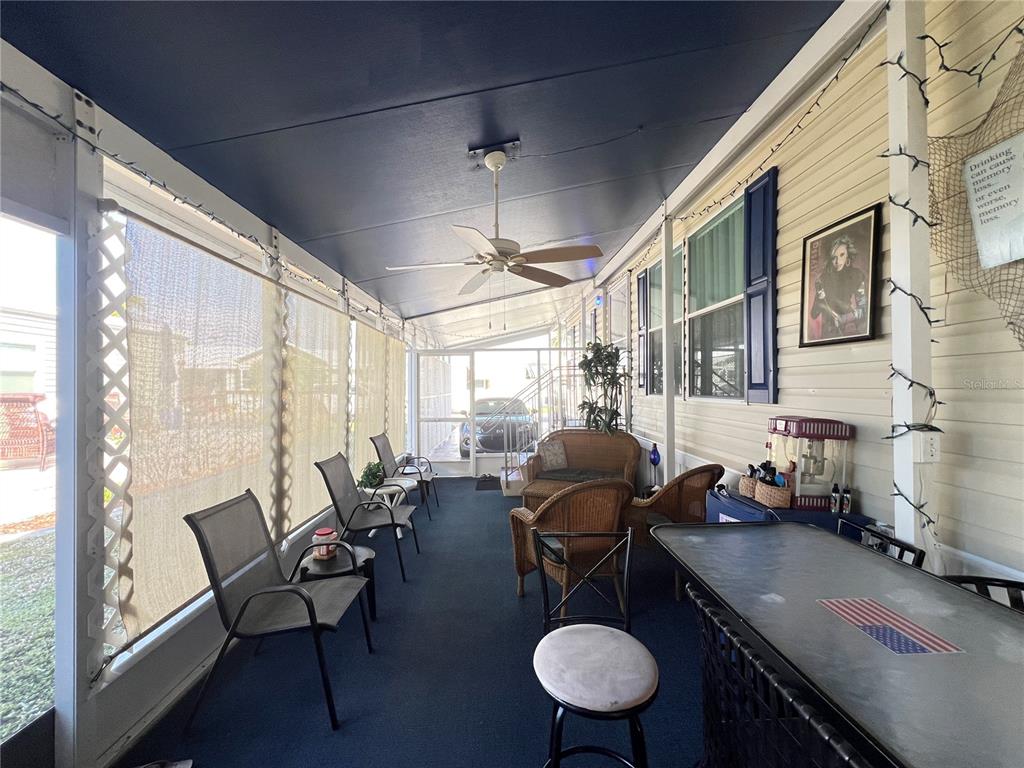 10100 Burnt Store Road, Unit 27 Punta Gorda, FL 33950 - Photo 33 of 37 a room with furniture